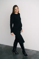 femme enceinte portant une robe de maternité et de grossesse noire chic